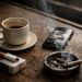 A quiet morning scene with coffee, cigarettes, and a phone on a table, showing how memes replacing conversation has become a form of silent distance.